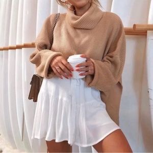 Super cute boxy turtleneck sweater by Vici